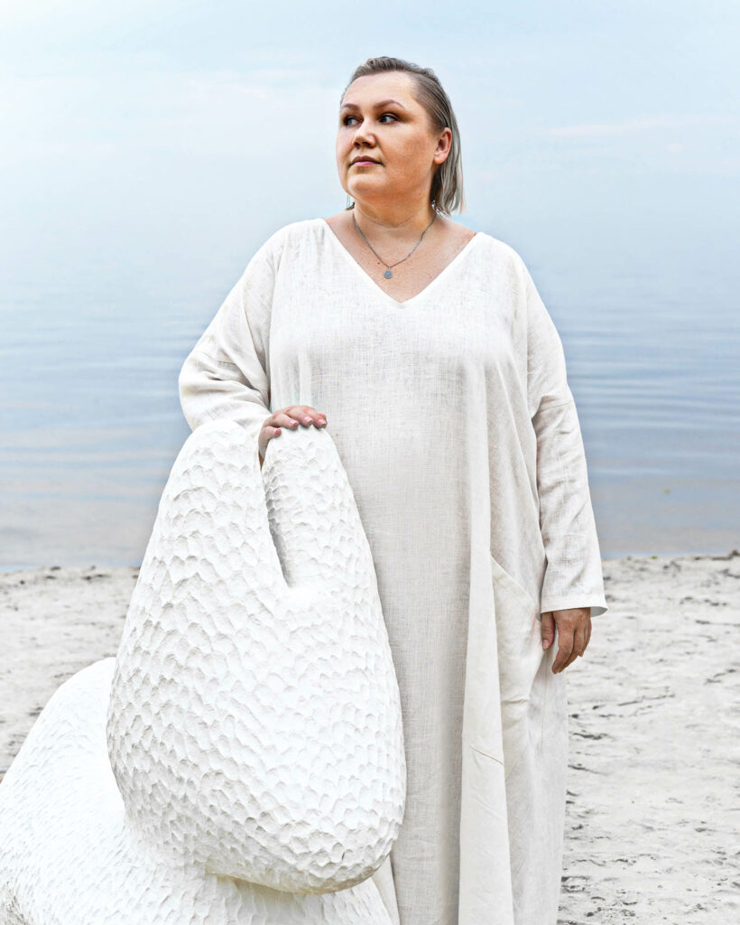 designer with her sculpture